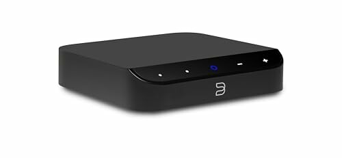 Black digital streaming device with buttons on top